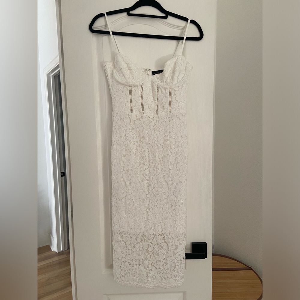 White lace Bardot dress.
